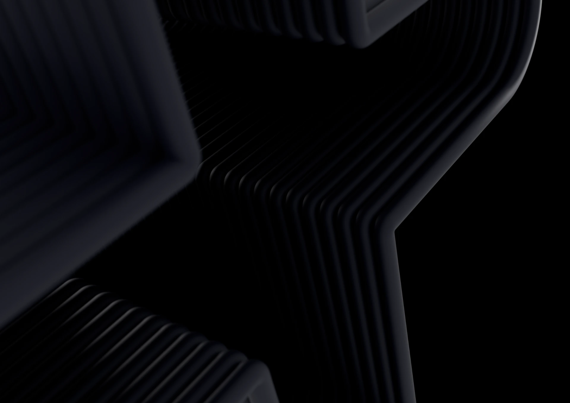 X 3d graphic in black with a black background representing X for XTM